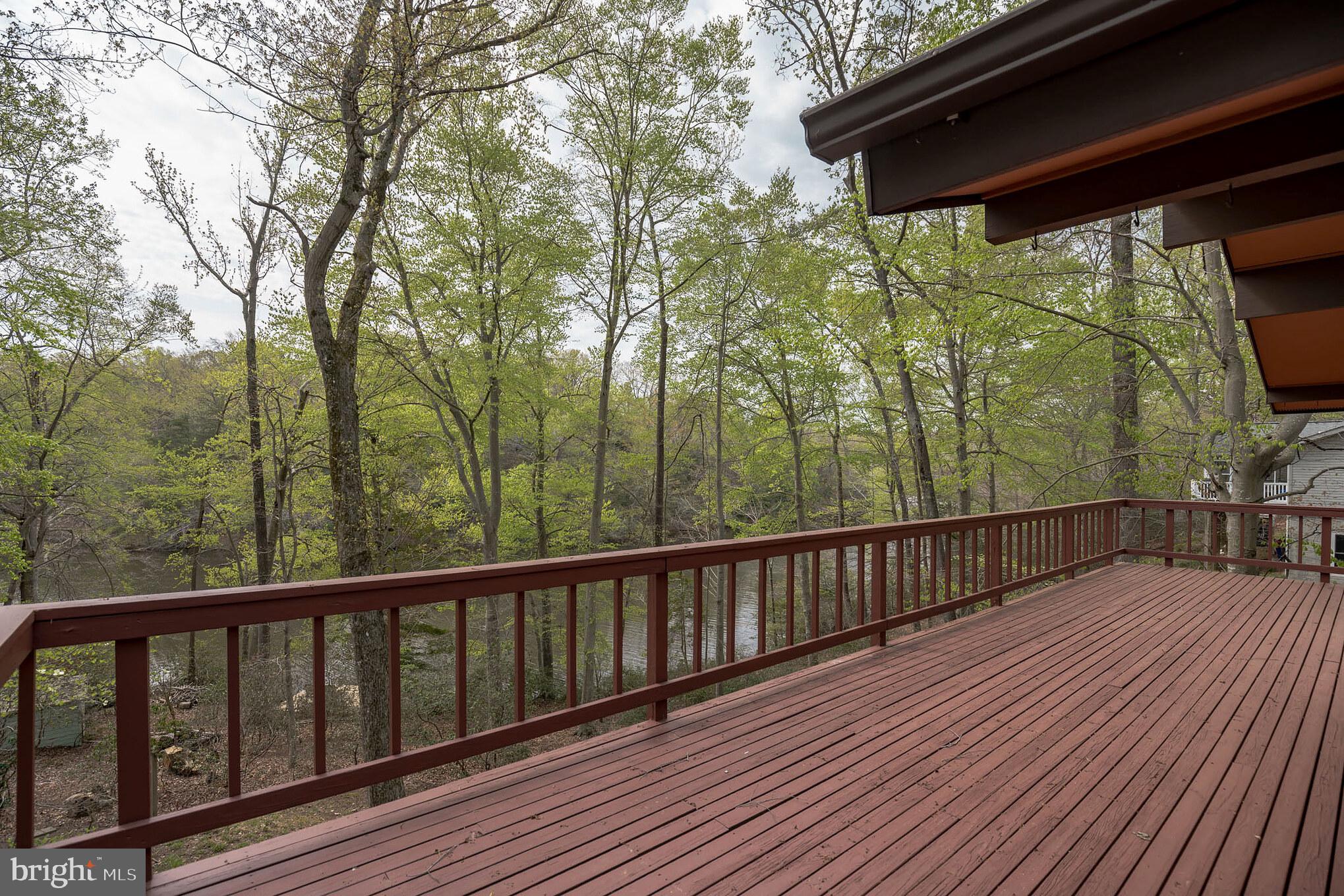 615 Running Fox Road Lusby, MD 20657 - Photo 18 of 30 Beautiful, large deck with lake views