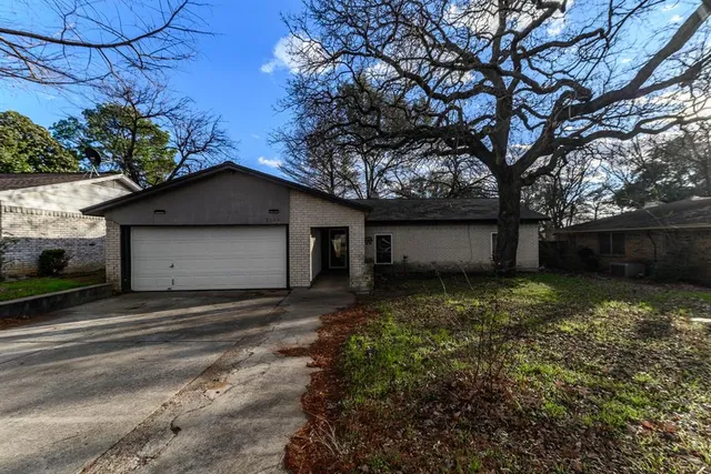 a house view with a outdoor space