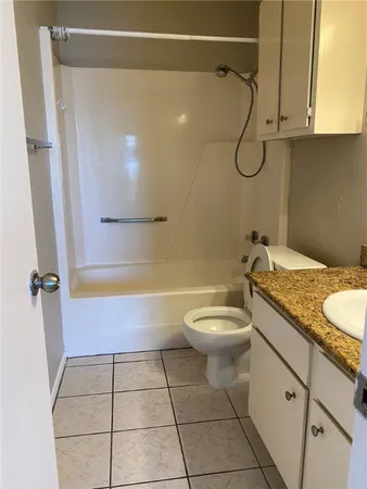 a balcony with furniture and city view