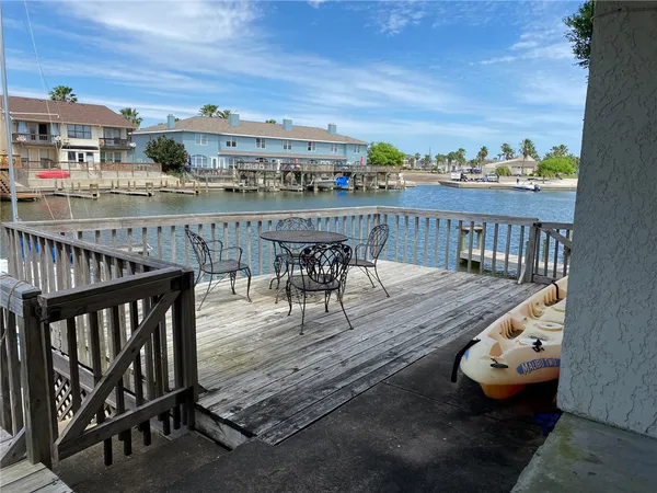 a view of a chairs on the roof deck