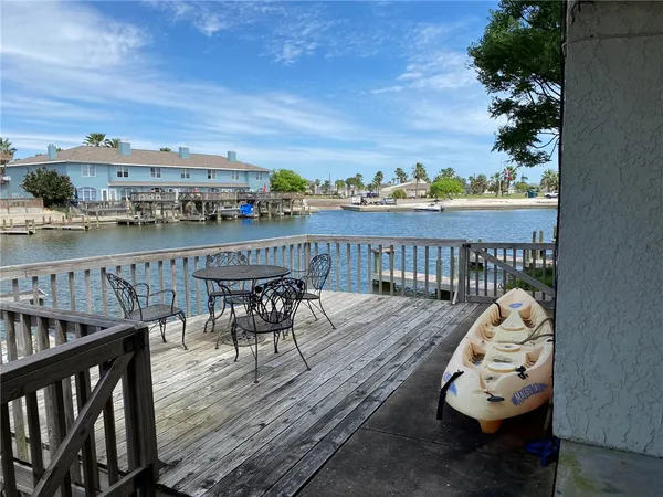 a view of a chairs and table on the wooden floor