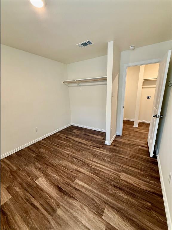 812 South 22nd Street Temple, TX 76501 - Photo 23 of 34 a view of a room with wooden floor and white walls
