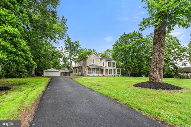 a front view of a house with yard