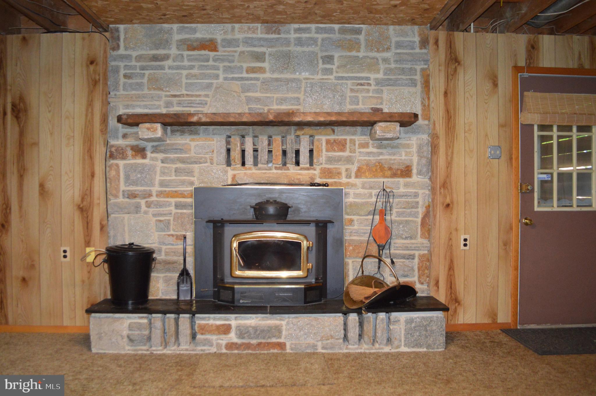 2736 Albert Rill Road Westminster, MD 21157 - Photo 16 of 28 Lower Level Fireplace with insert
