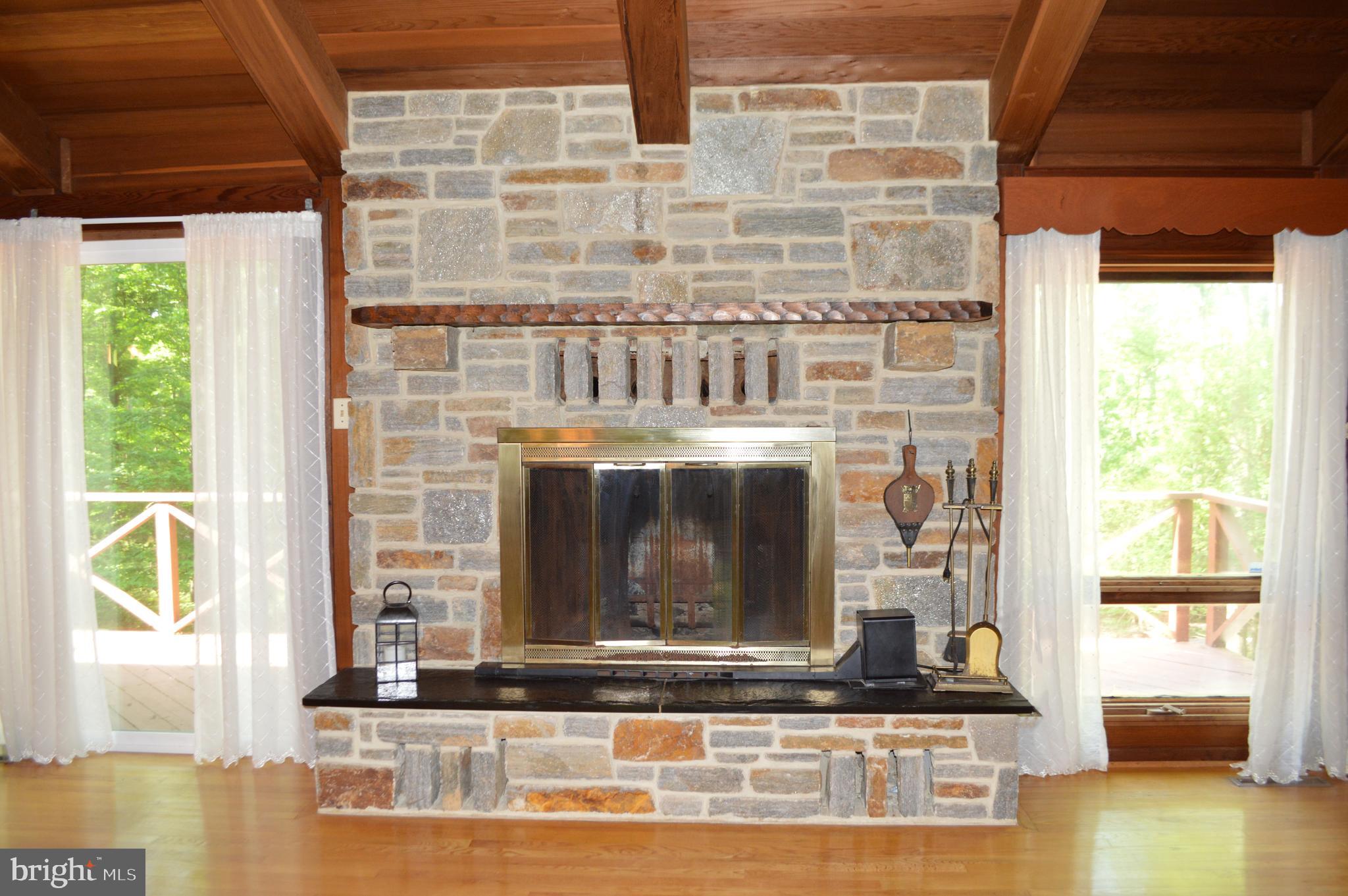 2736 Albert Rill Road Westminster, MD 21157 - Photo 6 of 28 Living Room stone fireplace
