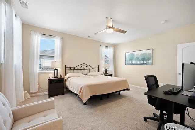 a bedroom with a bed furniture and a window