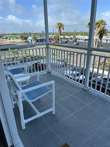 a view of a balcony with city view