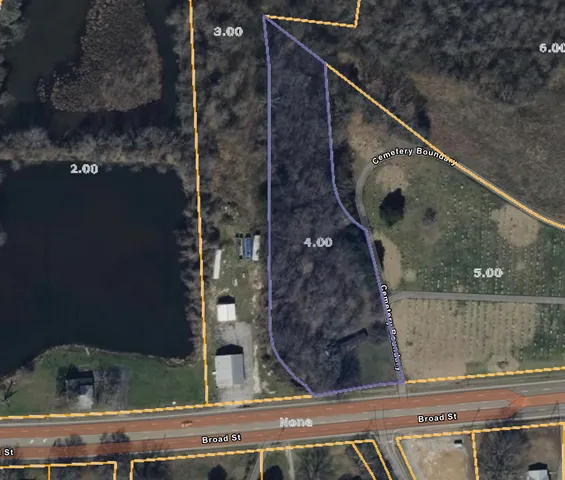 a view of entryway and kitchen