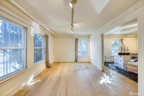a view of livingroom with furniture and wooden floor