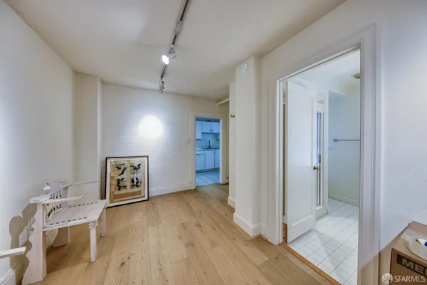 a view of a livingroom with wooden floor