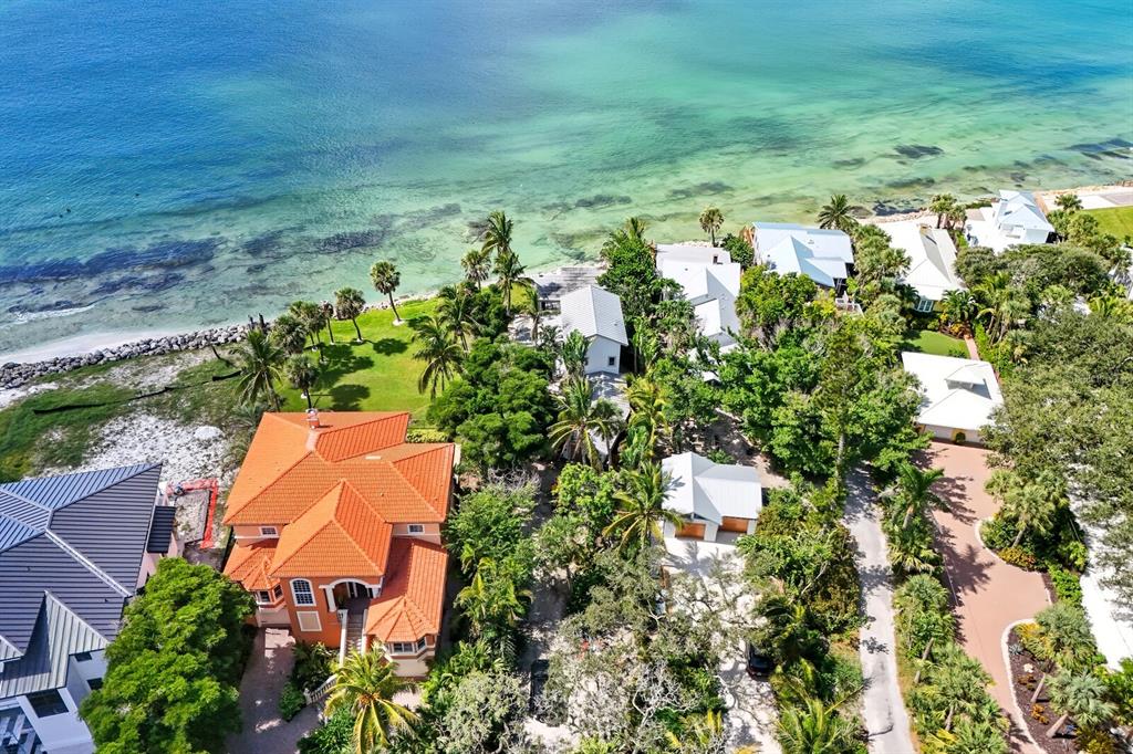 7314 Point Of Rocks Road Sarasota, FL 34242 - Photo 11 of 22 an aerial view of a house with a yard