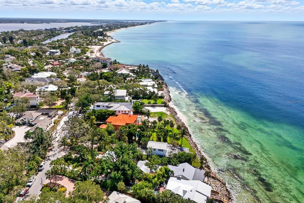 7314 Point Of Rocks Road Sarasota, FL 34242 - Photo 13 of 22 a view of a yard with an umbrella