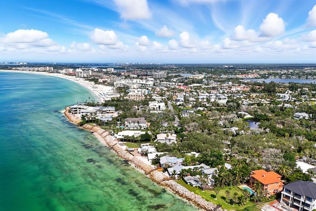 7314 Point Of Rocks Road Sarasota, FL 34242 - Photo 15 of 22 an aerial view of a city with lots of residential buildings in the back