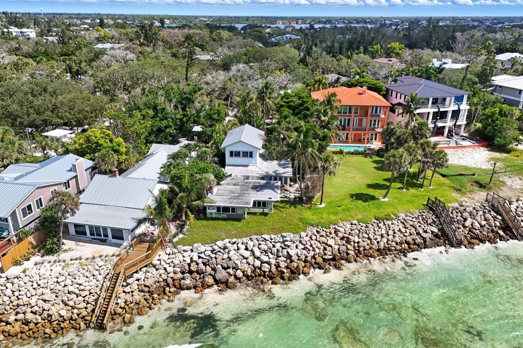 7314 Point Of Rocks Road Sarasota, FL 34242 - Photo 4 of 22 aerial view of a house with a garden