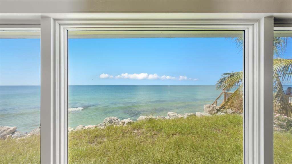 7314 Point Of Rocks Road Sarasota, FL 34242 - Photo 5 of 22 a view of a glass door