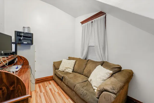 a living room with a couch and a flat screen tv