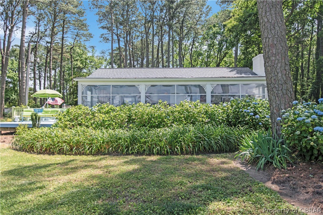 175 Seaside Way Gwynn, VA 23076 - Photo 8 of 48 a view of a house with a garden