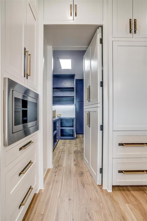 188 Ozro Road Venus, TX 76084 - Photo 13 of 32 a view of a hallway with wooden floor kitchen and entryway