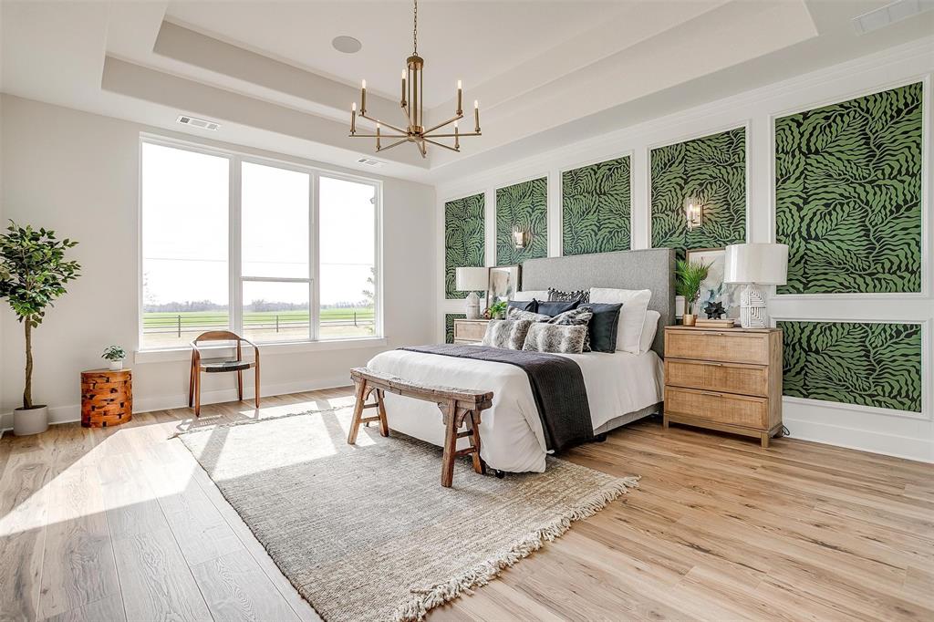 188 Ozro Road Venus, TX 76084 - Photo 15 of 32 a spacious bedroom with a bed a table and large windows