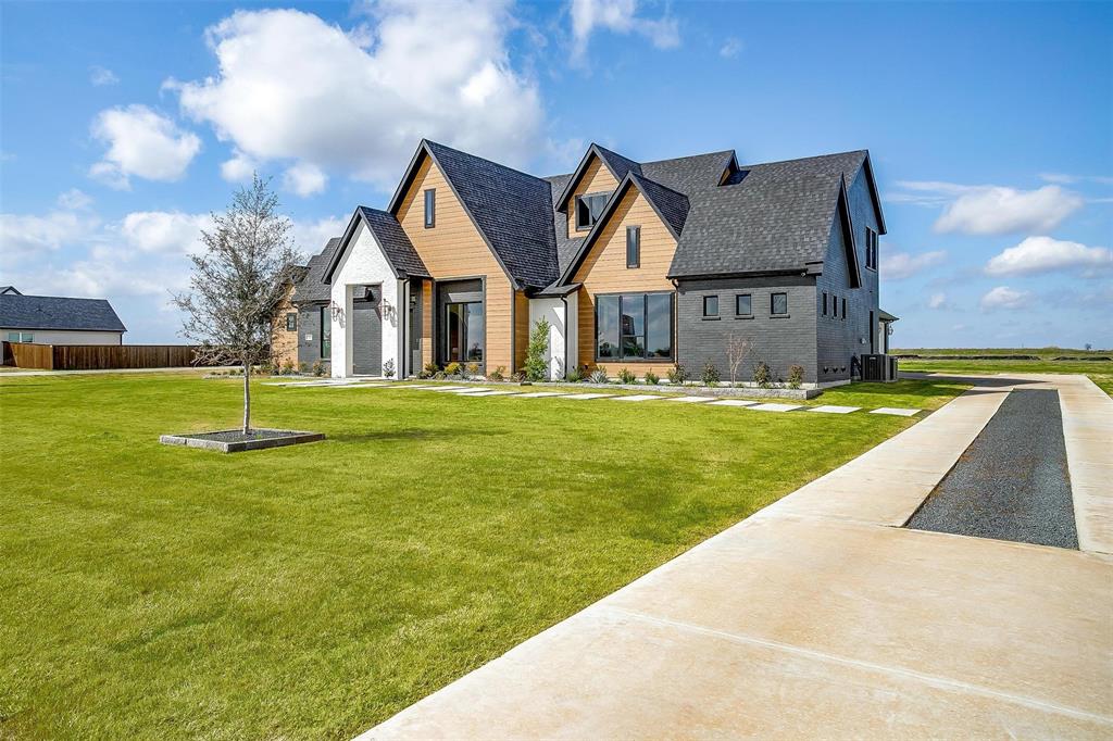188 Ozro Road Venus, TX 76084 - Photo 3 of 32 a view of a house with a big yard