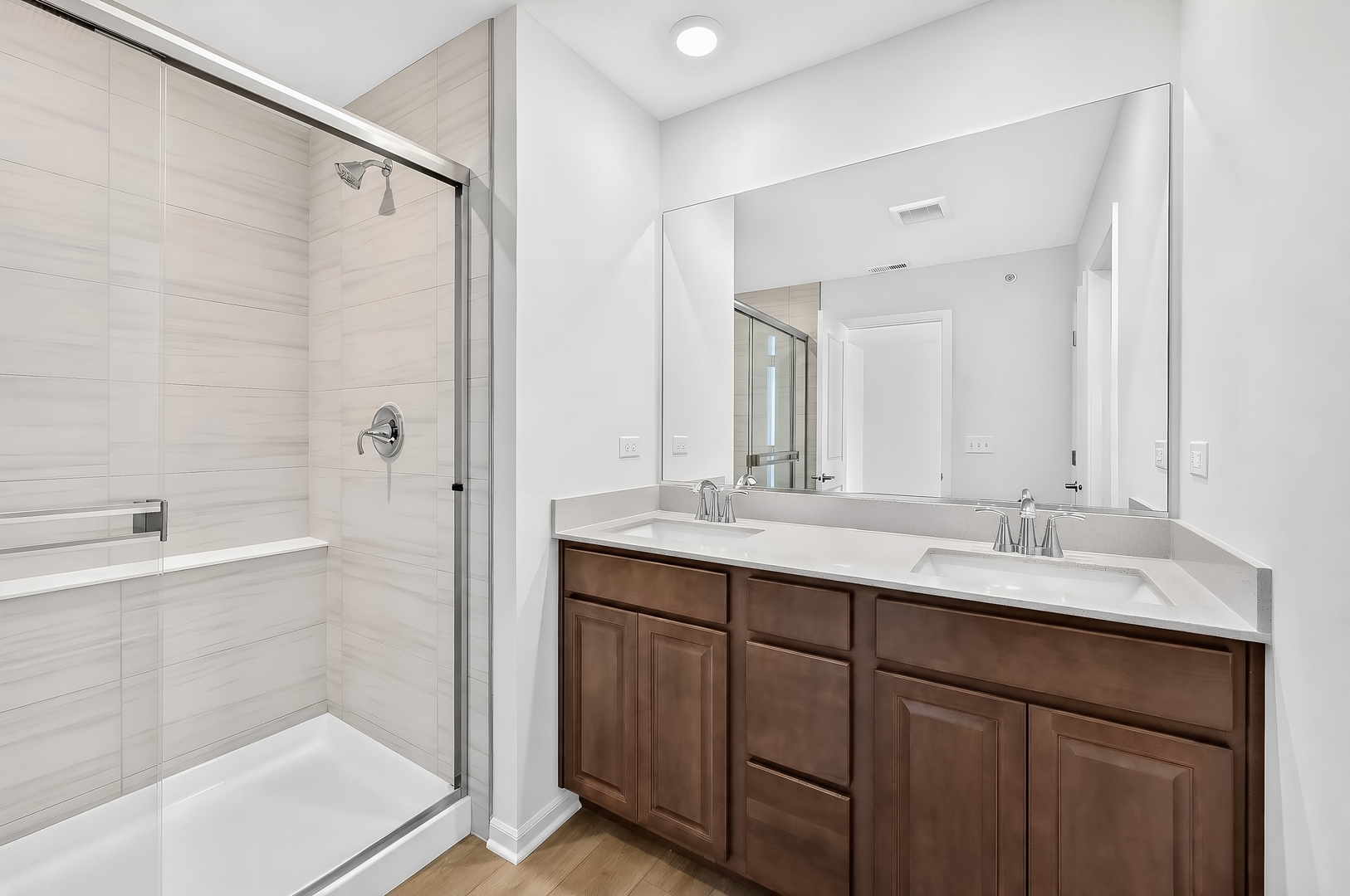 403 Cold Spring Street Algonquin, IL 60102 - Photo 11 of 18 a bathroom with a double vanity sink mirror and shower