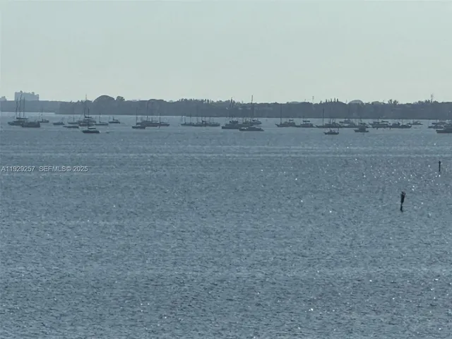 $530,000 | 150 Southeast 25th Road, Unit 7J, Miami, FL 33129