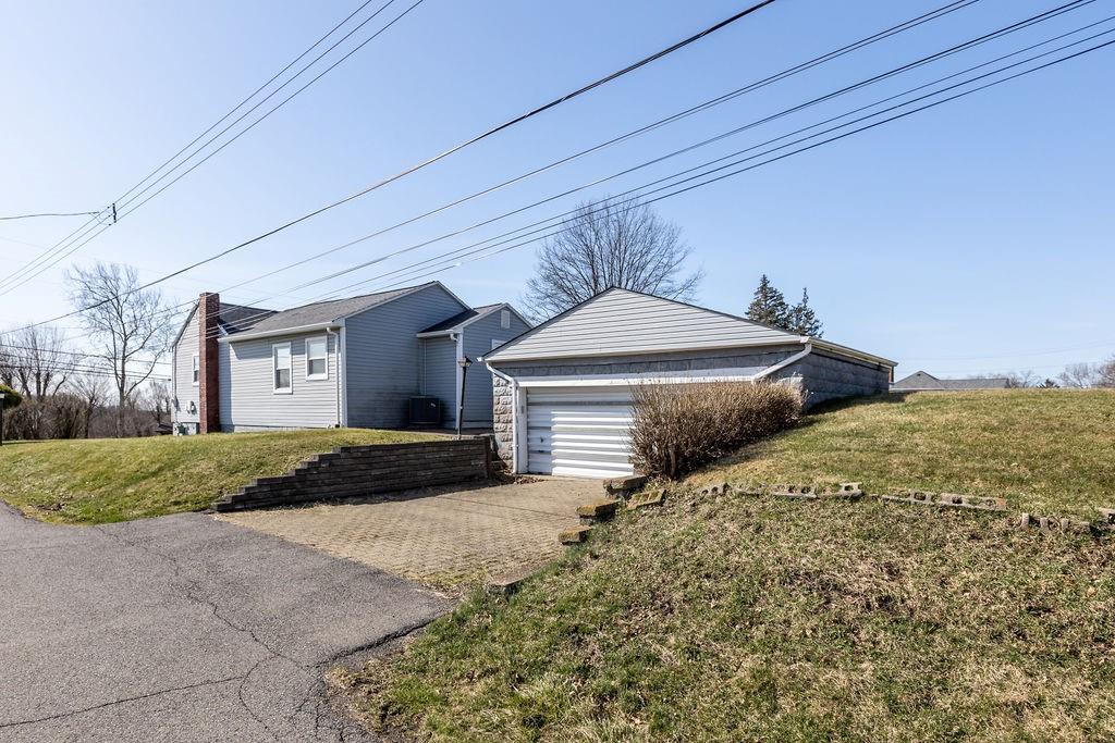60 Herbst Road Coraopolis, PA 15108 - Photo 1 of 17 a front view of a house with a yard and garage