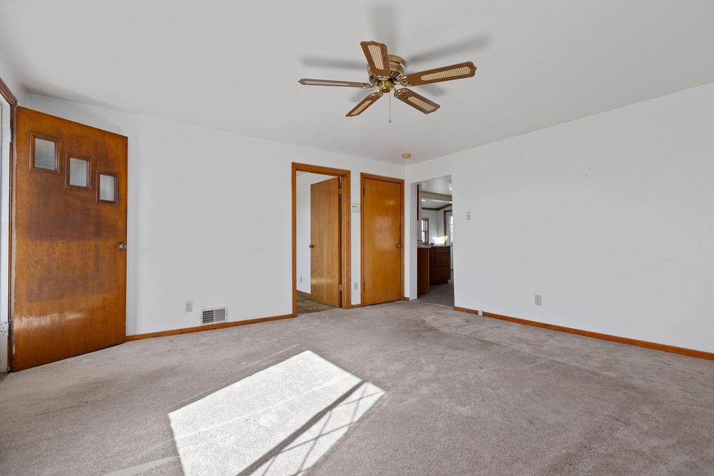60 Herbst Road Coraopolis, PA 15108 - Photo 5 of 17 an empty room with closet and windows