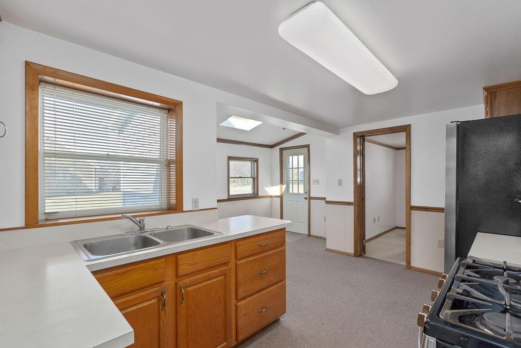 60 Herbst Road Coraopolis, PA 15108 - Photo 6 of 17 a kitchen with sink attached with living room