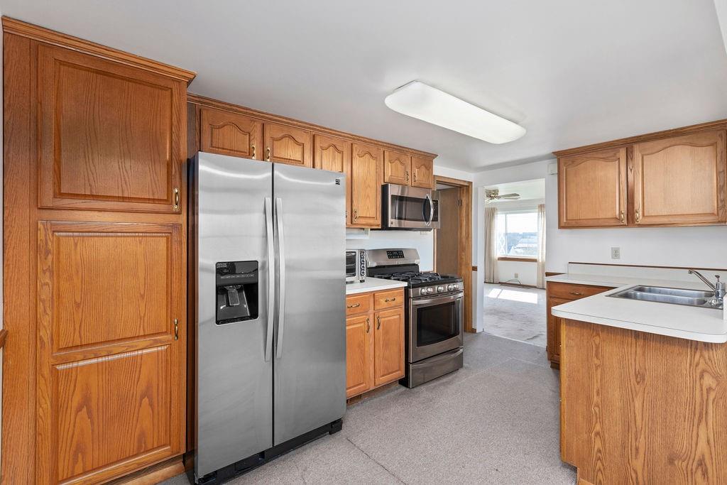 60 Herbst Road Coraopolis, PA 15108 - Photo 8 of 17 a kitchen with stainless steel appliances granite countertop a refrigerator stove a sink and dishwasher