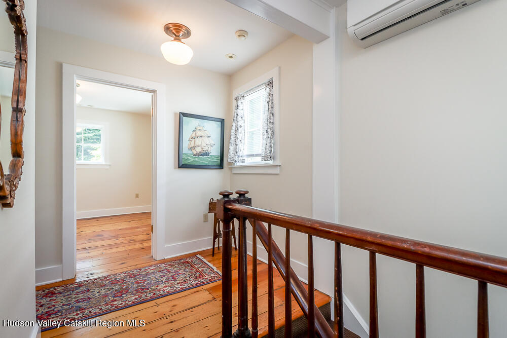 38 Main Street Chatham, NY 12037 - Photo 17 of 28 a view of entryway with a rug and wooden floor