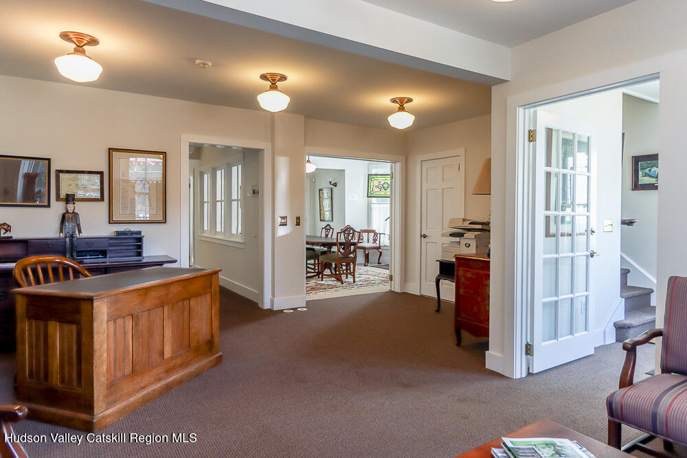 38 Main Street Chatham, NY 12037 - Photo 9 of 28 a view of a livingroom with bathroom and furniture