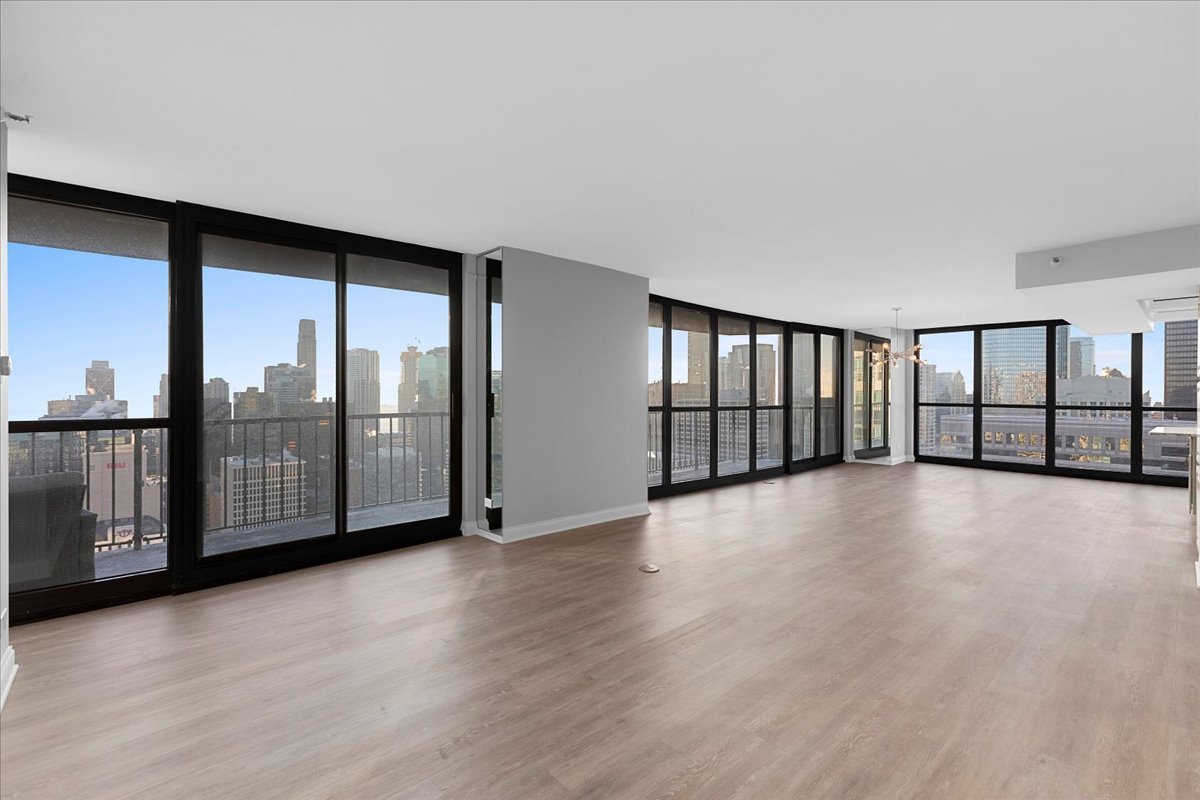 10 East Ontario Street, Unit 480102 Chicago, IL 60611 - Photo 14 of 41 a view of a big room with windows and floor to ceiling window