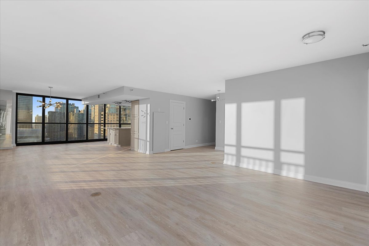 10 East Ontario Street, Unit 480102 Chicago, IL 60611 - Photo 15 of 41 a view of an empty room with a window