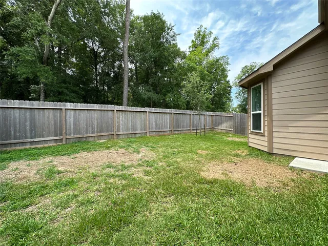a view of a backyard with a garden