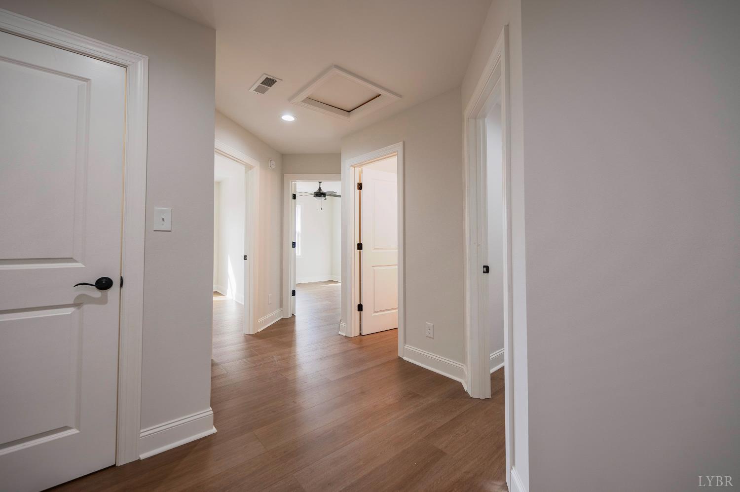 536 Leesville Road, Unit 207 Lynchburg, VA 24502 - Photo 19 of 47 a view of a hallway with wooden floor