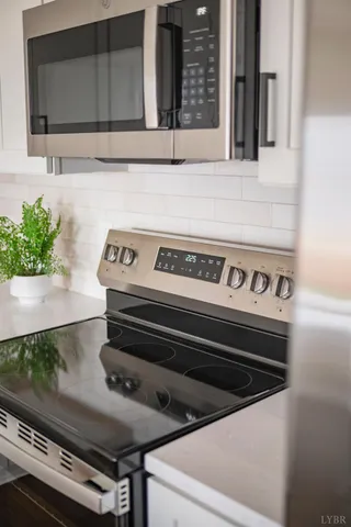 a close view of a stove top oven and sink