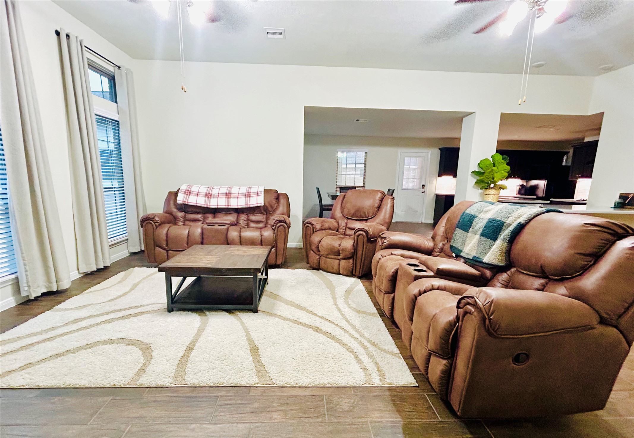 7114 Limestone Circle Manvel, TX 77578 - Photo 8 of 23 a living room with furniture and a fireplace