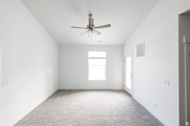 4653 South Alder Drive, Unit H304 Mapleton, UT 84664 - Photo 3 of 14 Unfurnished room featuring light colored carpet and ceiling fan