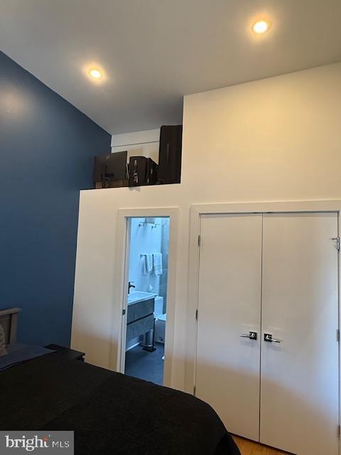 1221 Oates Street Northeast, Unit C Washington, DC 20002 - Photo 16 of 33 a view of a hallway to a room with wooden shelves