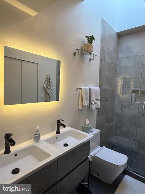 1221 Oates Street Northeast, Unit C Washington, DC 20002 - Photo 17 of 33 a bathroom with a sink and a mirror