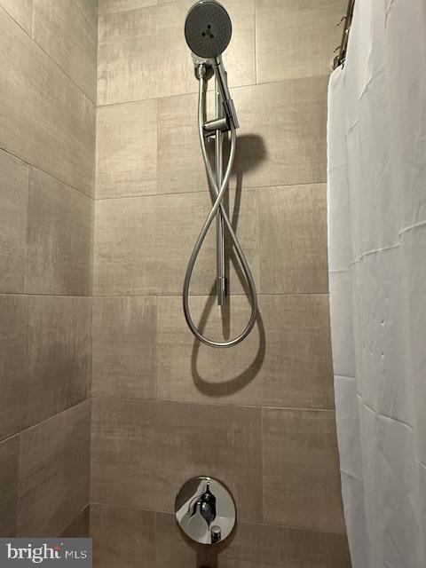 1221 Oates Street Northeast, Unit C Washington, DC 20002 - Photo 23 of 33 a bathroom with a shower