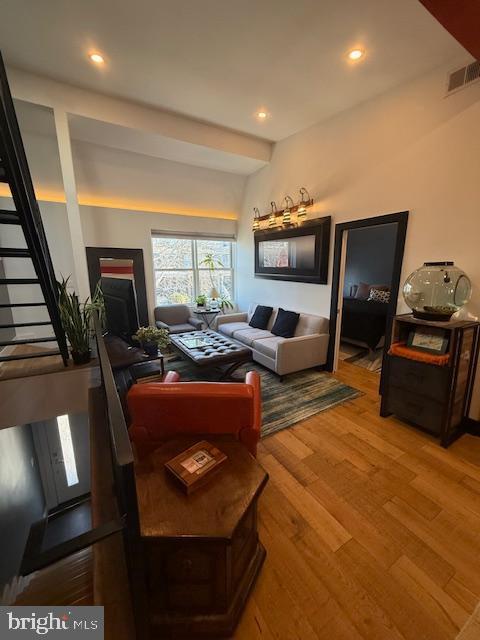 1221 Oates Street Northeast, Unit C Washington, DC 20002 - Photo 3 of 33 a living room with furniture and a flat screen tv