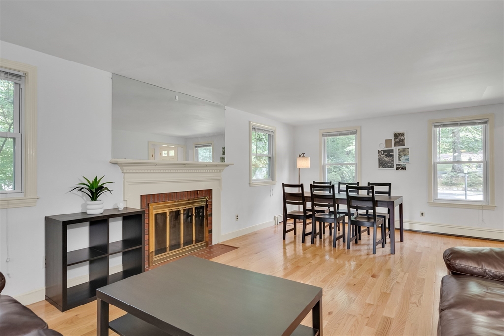 32 Dewey Road Lexington, MA 02420 - Photo 7 of 32 a view of a livingroom with furniture window and wooden floor