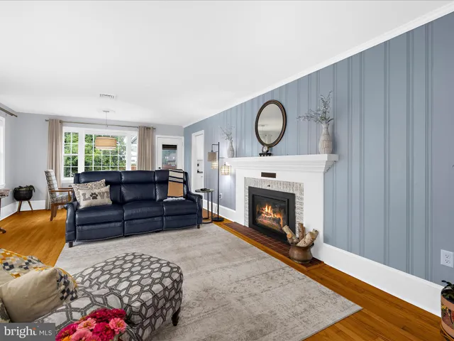 a bedroom with a bed and a fireplace