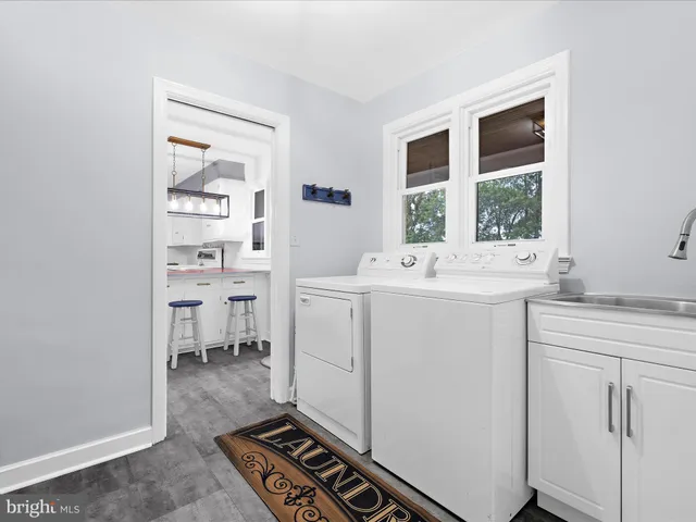 a bedroom with a bed and flat screen tv