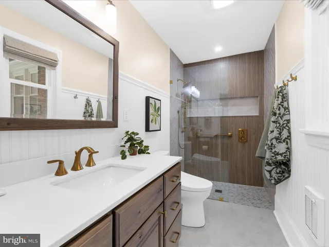 a view of a big yard with a house in the background