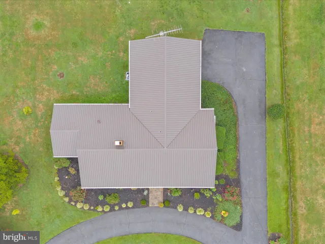 a view of a lake with a yard