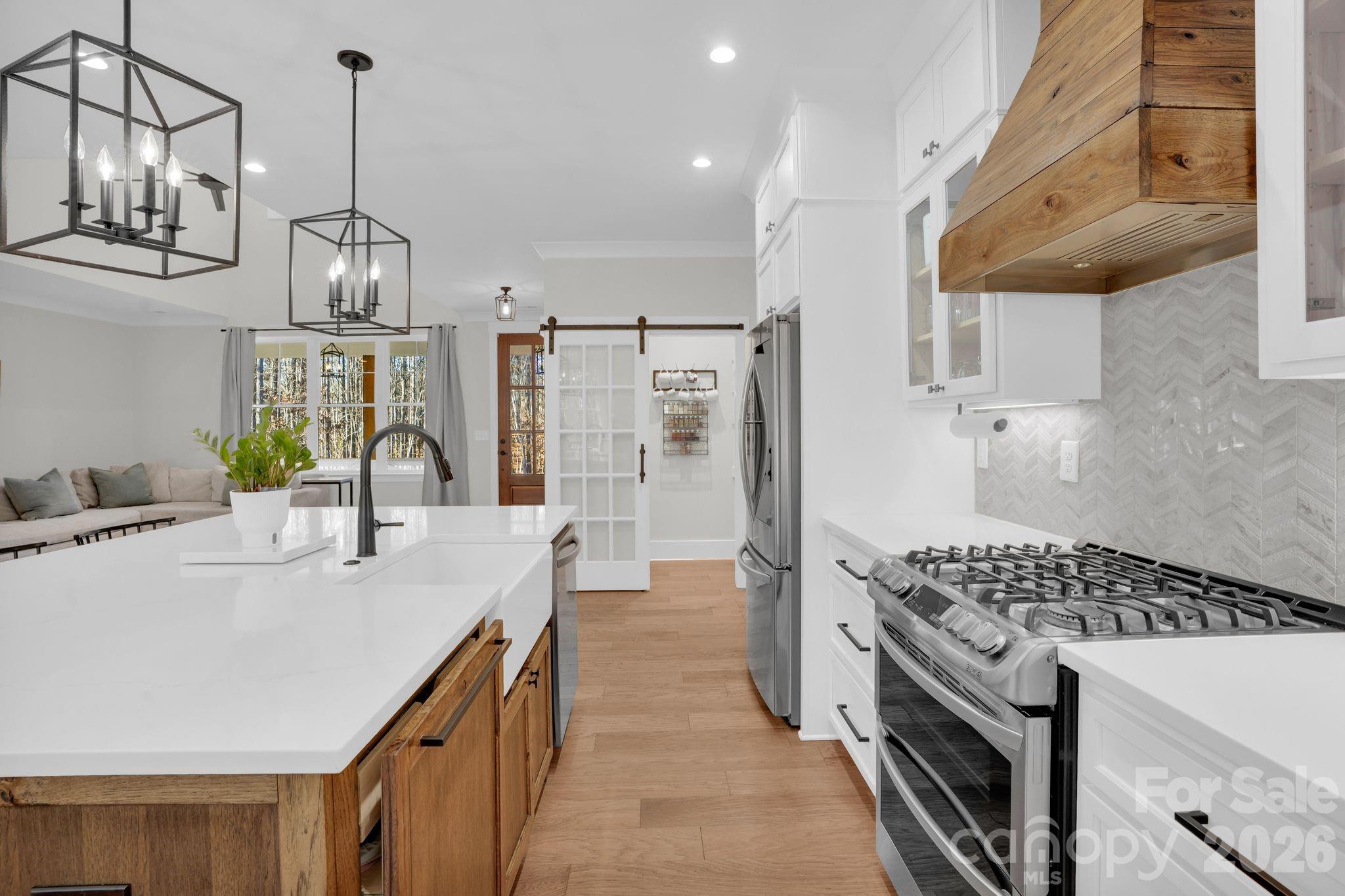 3134 Ranger Road Clover, SC 29710 - Photo 11 of 29 a kitchen with stainless steel appliances a sink stove and refrigerator