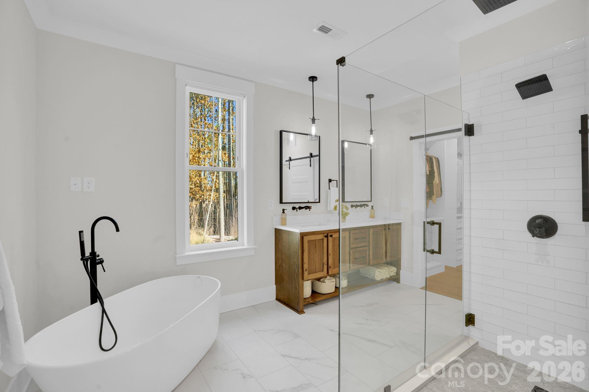 3134 Ranger Road Clover, SC 29710 - Photo 17 of 29 a bathroom with a tub sink and mirror